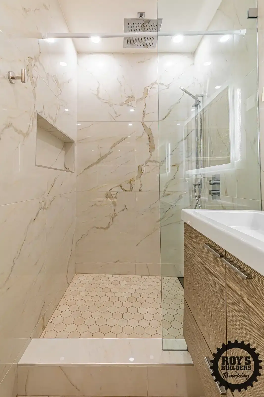 Glass shower renovation by Roy's Builders and Remodeling