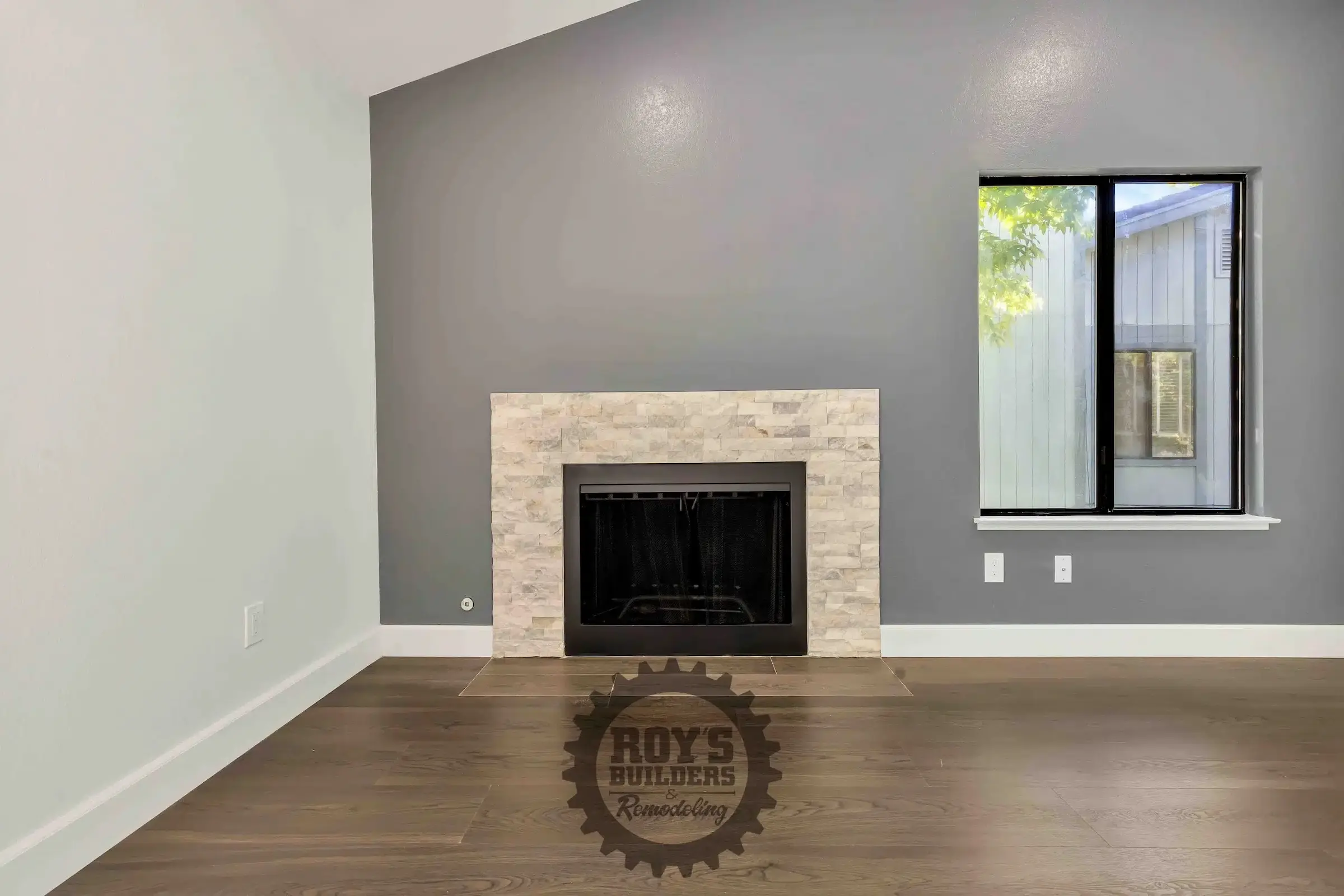 Cozy Living Room Remodel with Fireplace- Roy's Builders