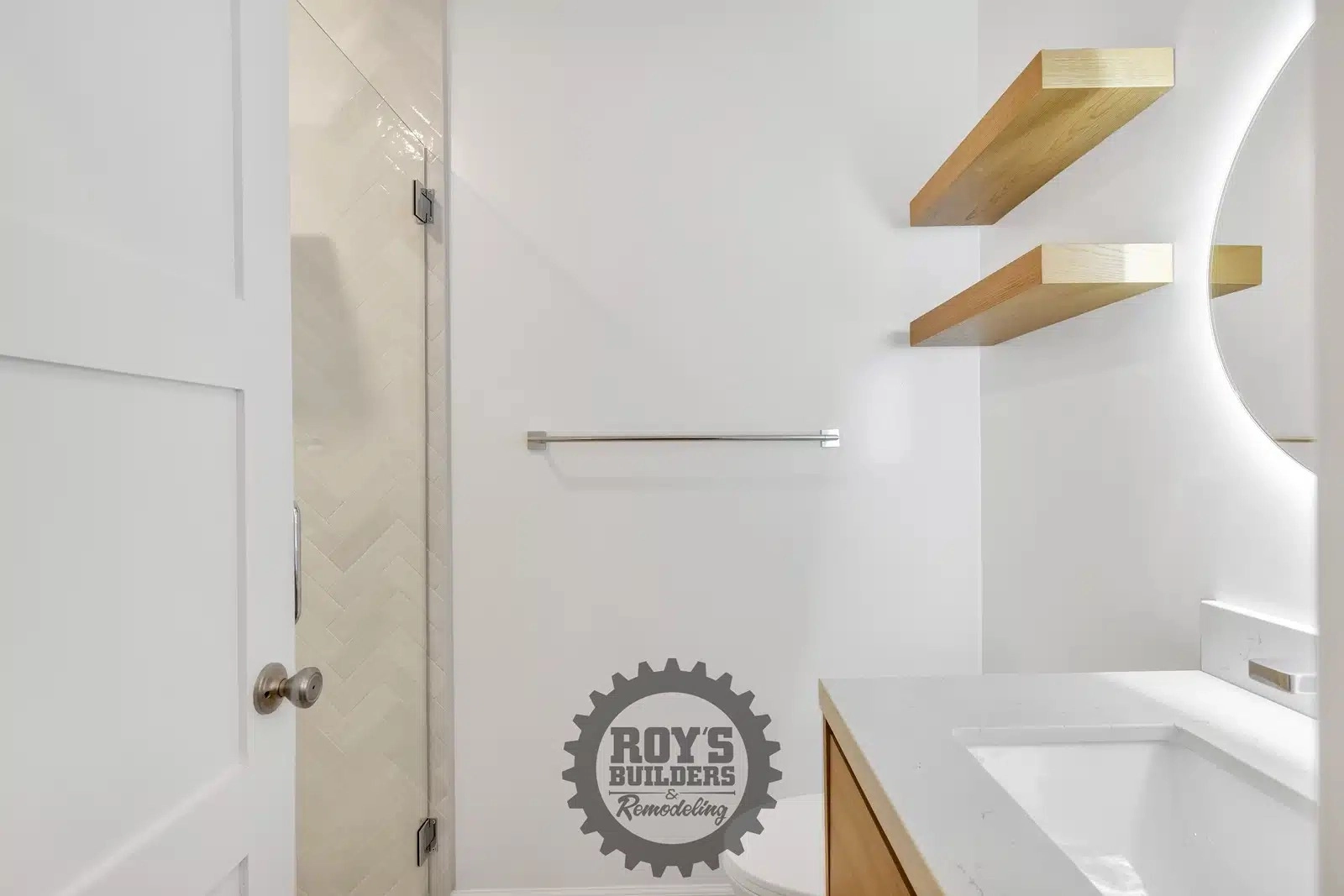 Elegant Bathroom Remodel with Wooden Shelves- Roy's Builders