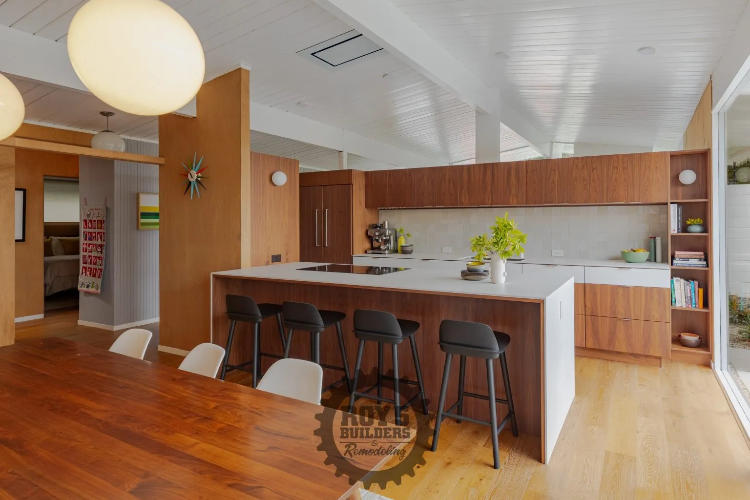 Mid-Century Kitchen With Island Seating- Roy's Builders and Remodeling