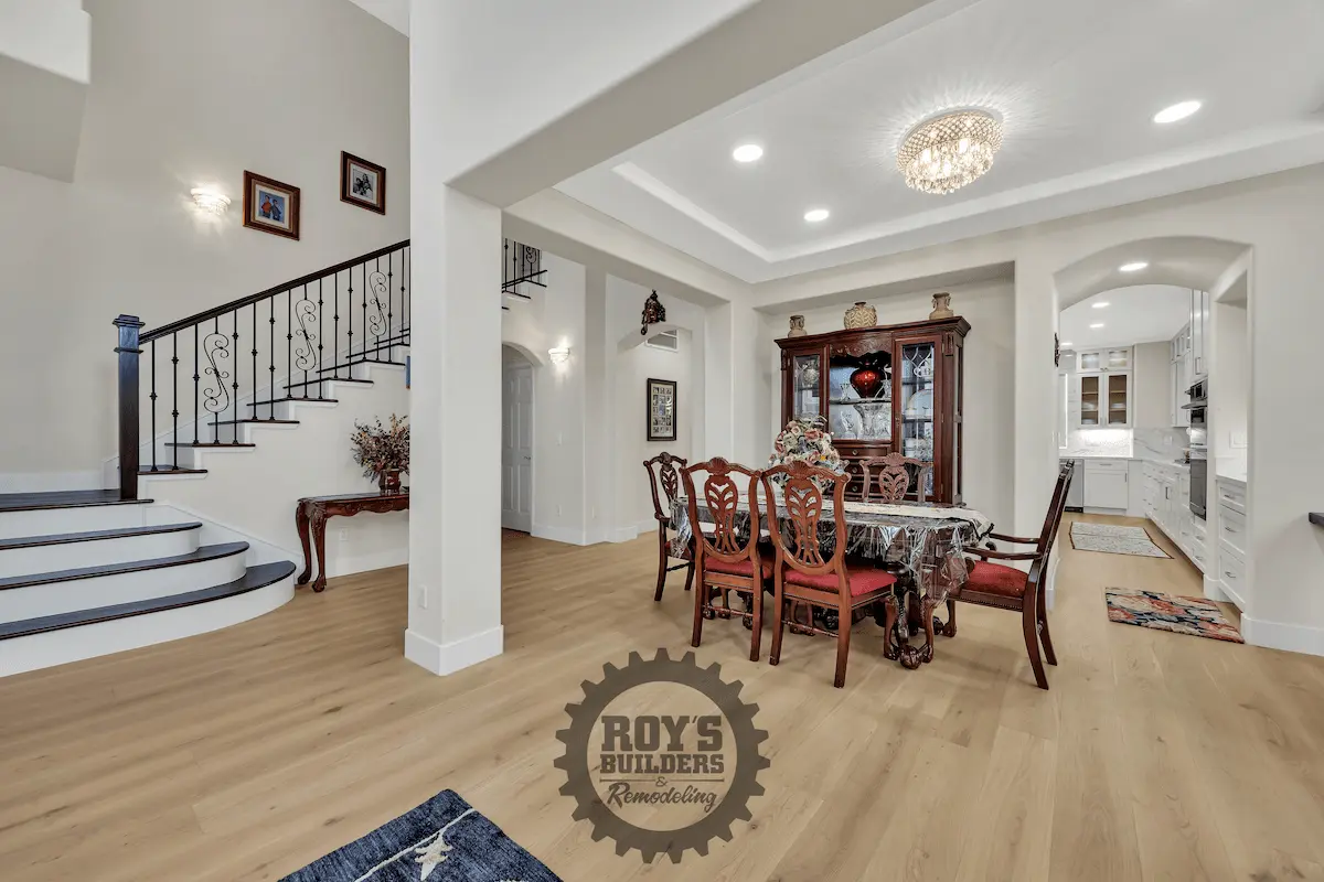 View of stairs with white walls and iron balusters