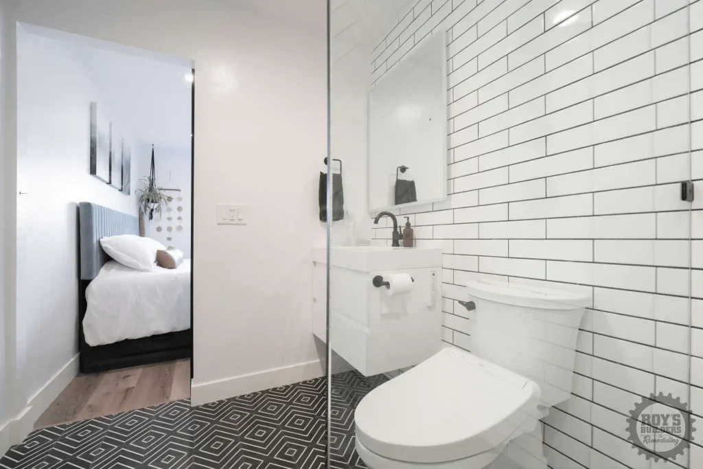 Modern bathroom with black and white tile accents