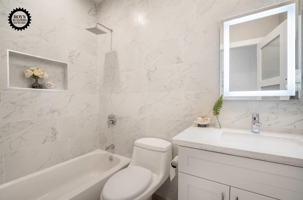 Elegant white marble bathroom with shower