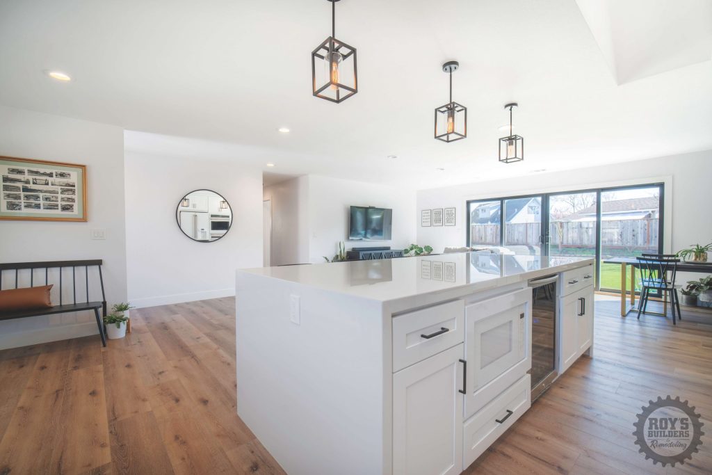 Kitchen with white cabinets and wood floor