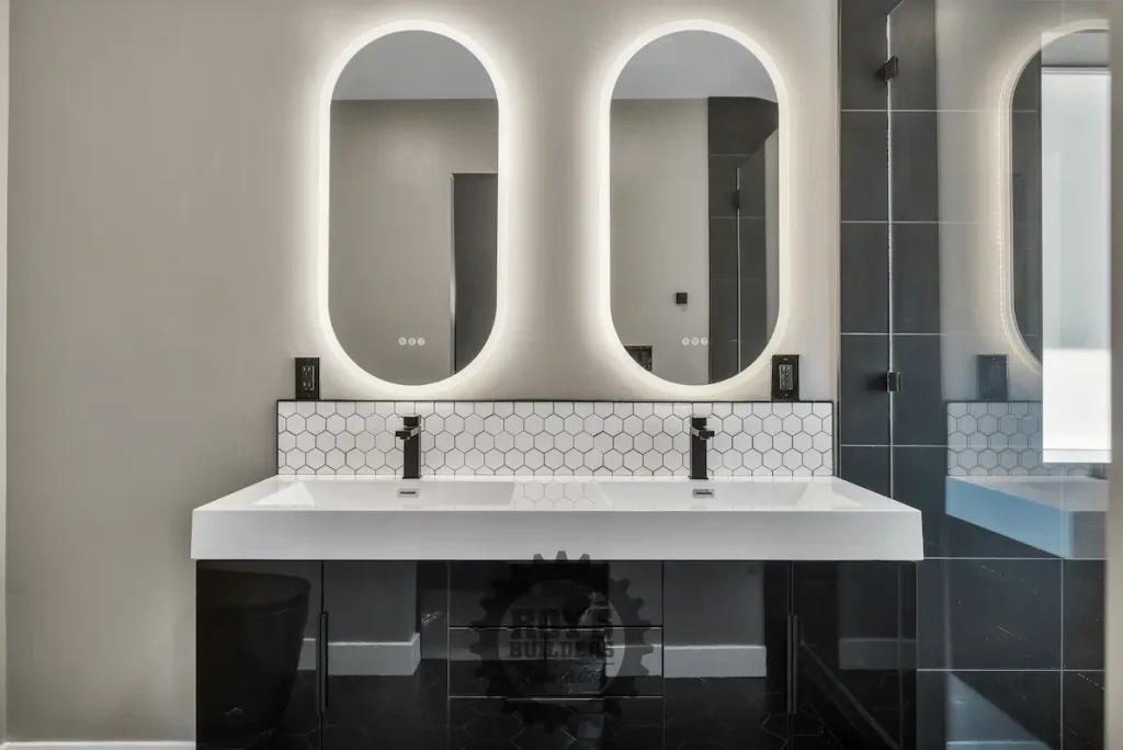 Open kitchen view with bar seating and lighting