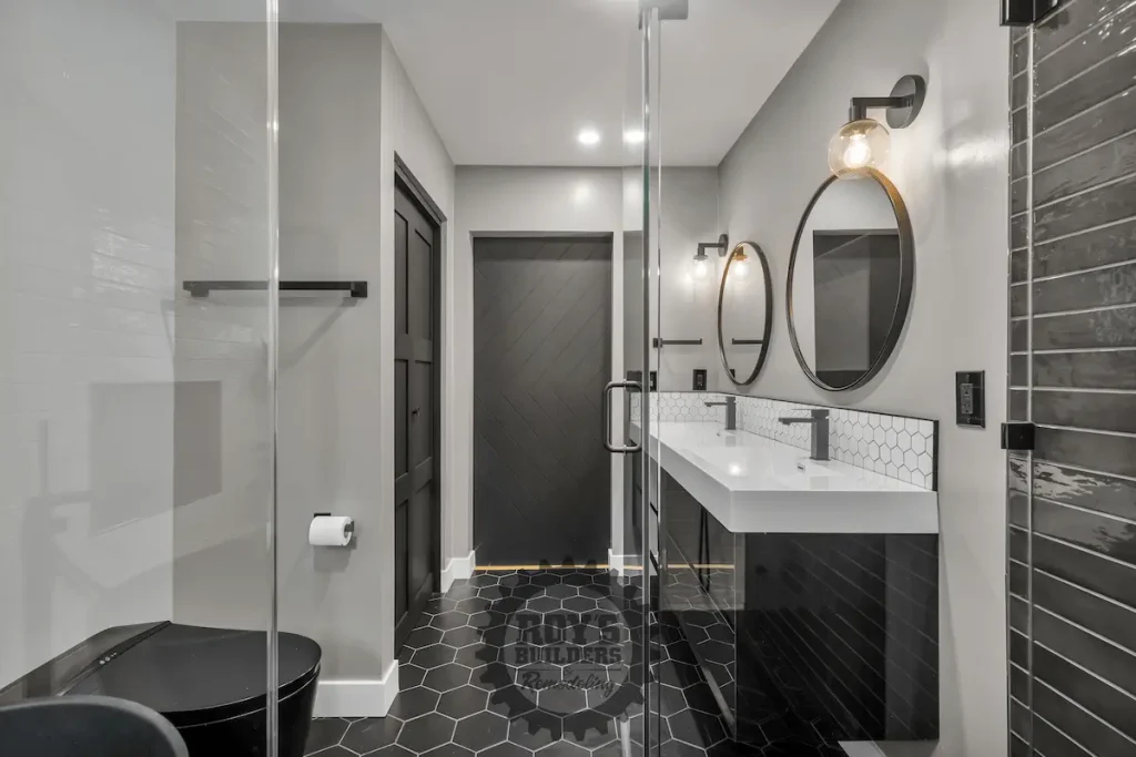 Dark double vanity with round mirrors
