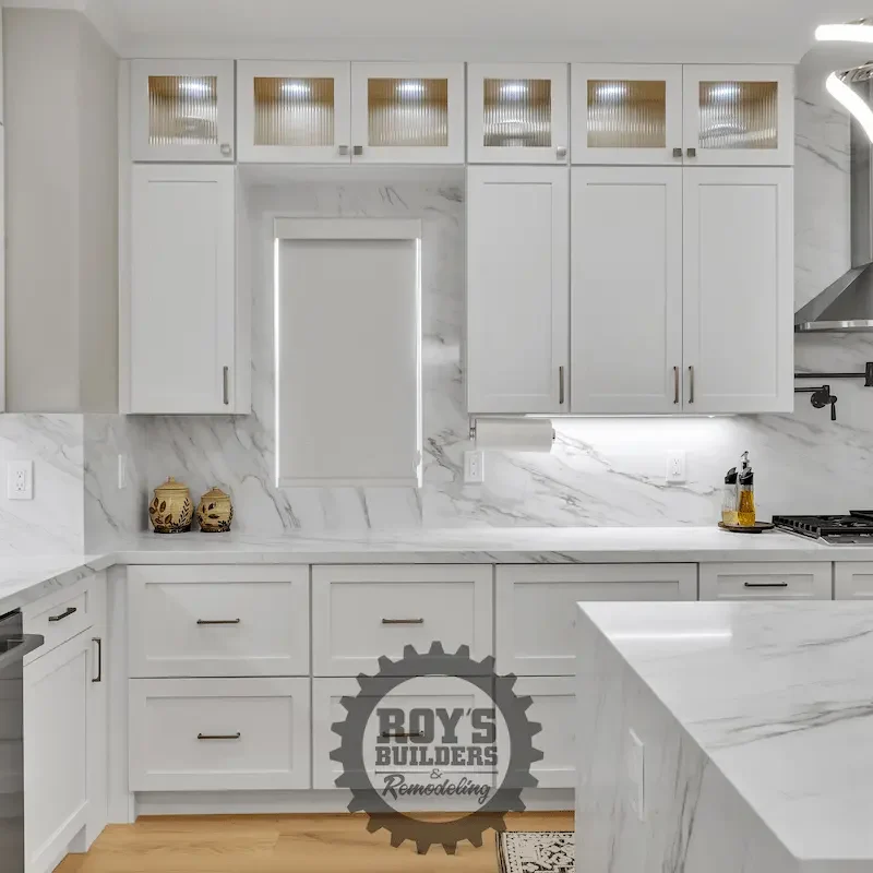 Kitchen with white cabinetry and countertop space
