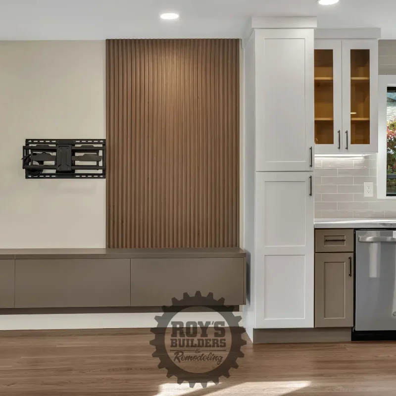 Modern living room view highlighting a wood-paneled accent wall.