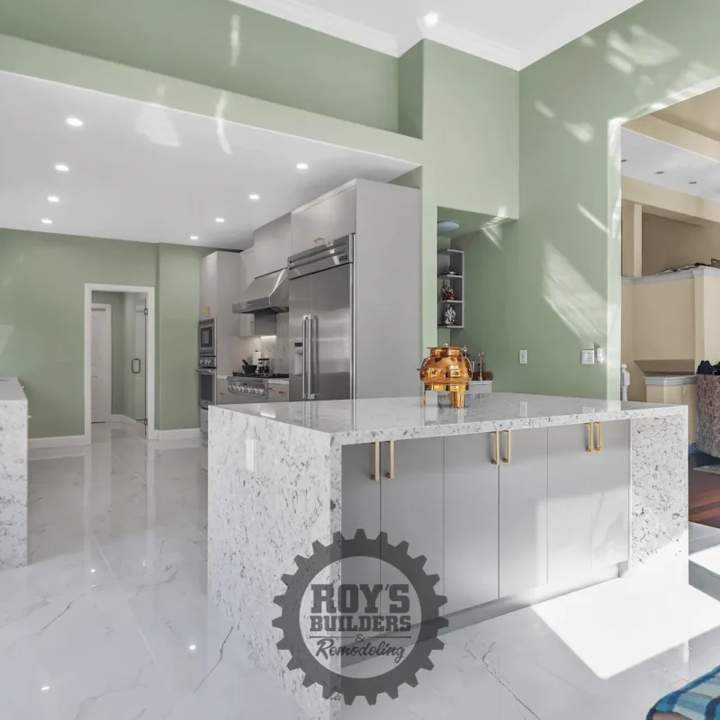 Sleek gray kitchen cabinets and appliances