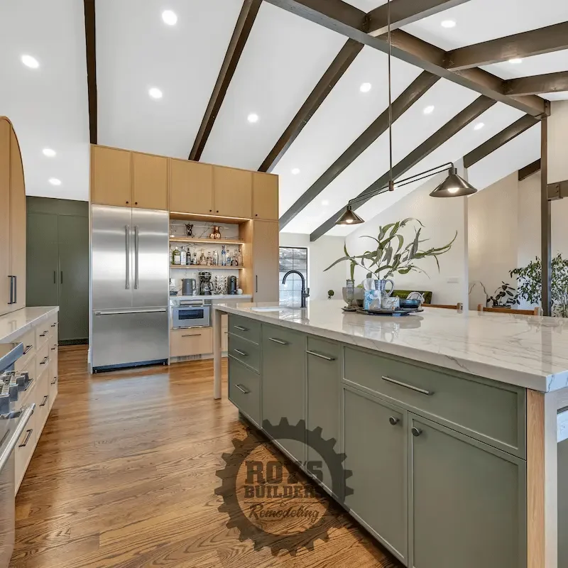 Dining area with wooden chairs and light fixtures.
