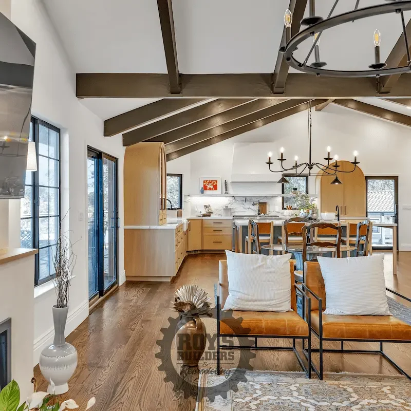 Dining area with wooden table and view.