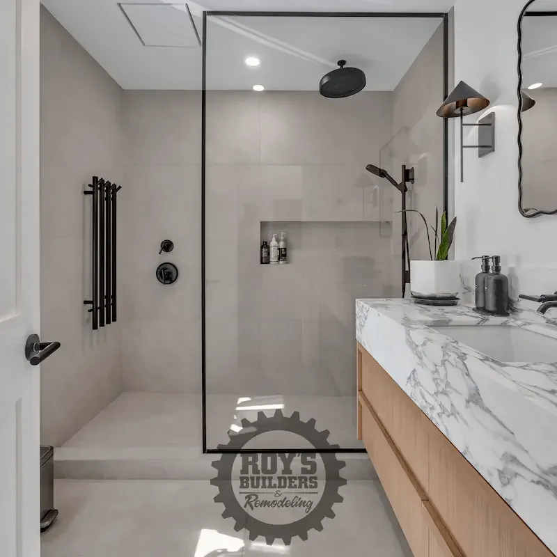 Modern bathroom vanity with black lighting.