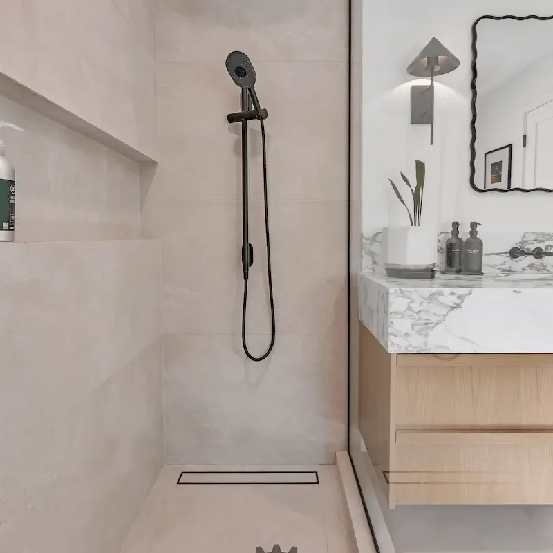 Shower area with sleek, modern design.