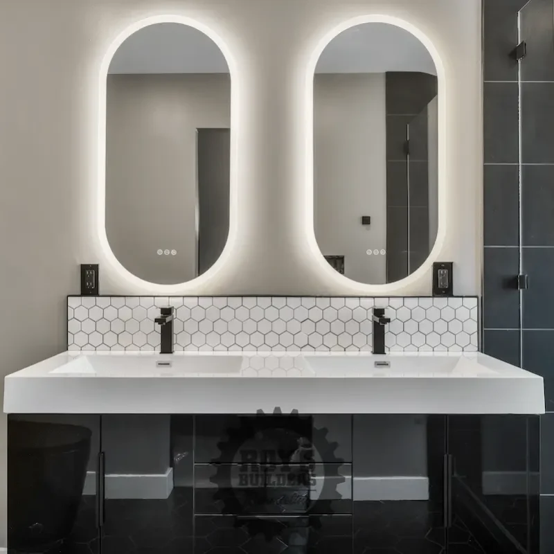 Open kitchen view with bar seating and lighting