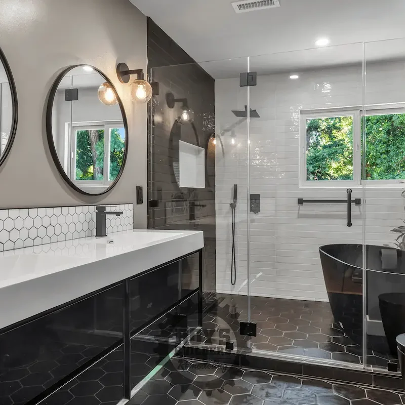 Elegant bathroom with round mirror and vanity