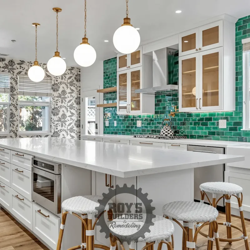 Green accent backsplash and white cabinets