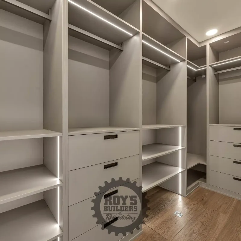 Custom walk-in closet organizers with built-in shelving.